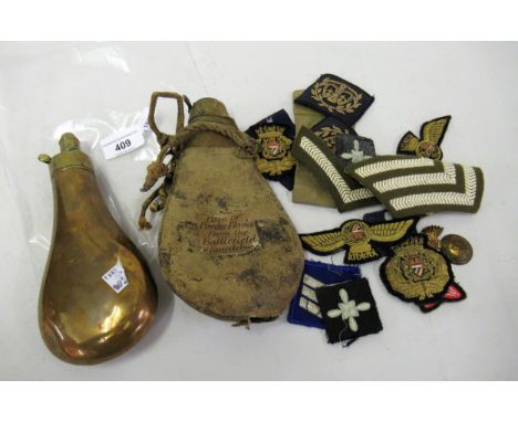 Brass and leather powder flask inscribed ' From the battlefield of Paardebur ', together with a brass and copper shot flask, 