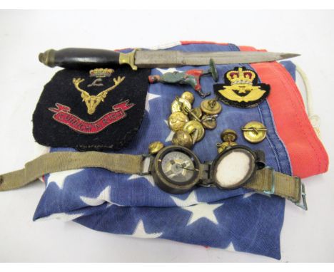 Military issue wrist compass, together with a small quantity of military buttons and two badges, and a Middle Eastern dagger,