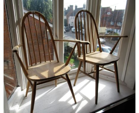 Ercol stickback open elbow chair and another similar stickback elbow chair 