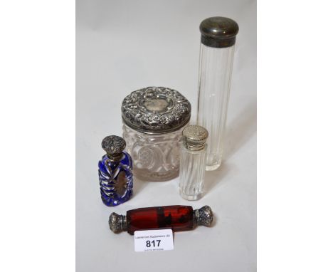 Double-ended ruby glass scent bottle, two other scent bottles and two silver mounted glass dressing table jars 