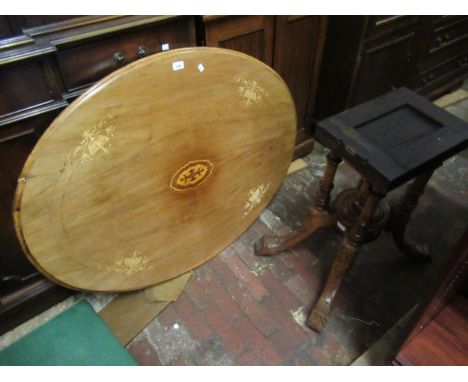 Victorian figured walnut and marquetry inlaid oval centre table on a cluster column quadruped base, 35ins x 44ins approximate