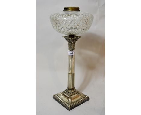 Good quality silver plated Corinthian column oil lamp, with a glass well, 17ins highNo drill holes, no cracks, does have scra