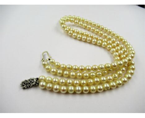 Double row uniform cultured pearl necklace with 9ct gold clasp, 44cms 