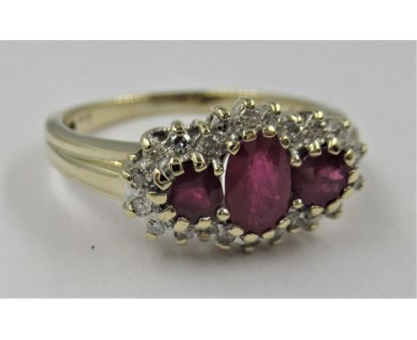 9ct Yellow gold ruby and diamond triple cluster ring, size P 