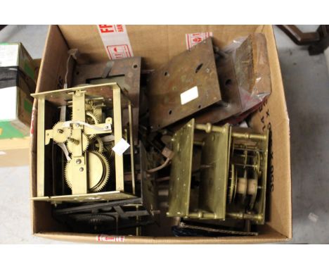 Quantity of various longcase clock movements and parts 