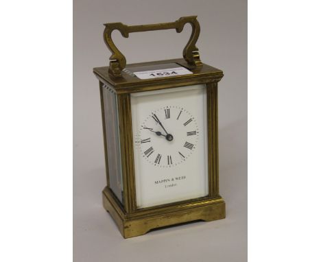 Small mid 20th Century gilt brass cased carriage clock, the enamel dial with Roman numerals signed Mappin & Webb, London, wit