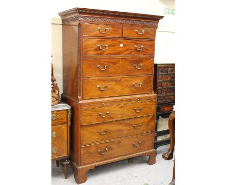 George III mahogany tallboy, the moulded dentil and blind fretwork cornice above two short and three long drawers flanked by 