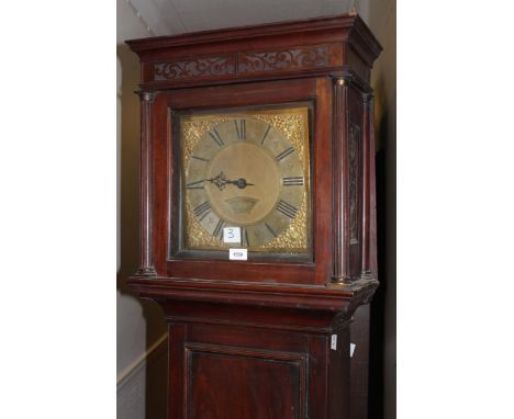 Mahogany longcase clock, the square hood with a blind fretwork pediment and flanking pilasters, above a rectangular moulded d