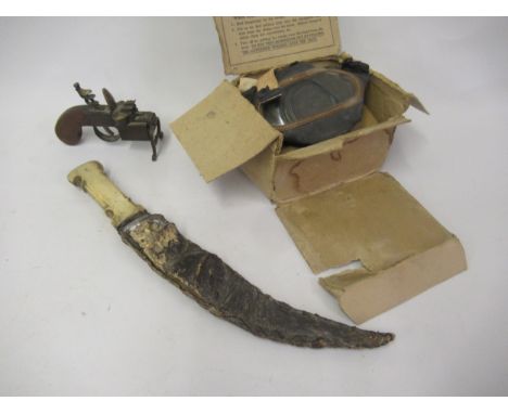 Antique Middle Eastern bone handled dagger with leather scabbard, Dunhill tinder pistol table lighter and a 1940's boxed chil