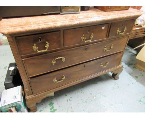19th Century mahogany commode, the rouge marble top above three short and two long drawers with cast brass handles, raised on