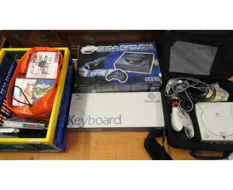 Sega games console with original box, together with a quantity of other games consoles and various games etc. 