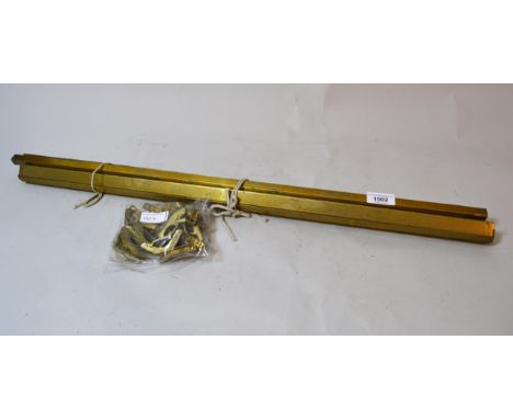 Quantity of brass stair rods with clips and a vintage Esso petrol can 