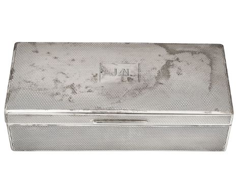 A George V silver table cigarette boxLondon, 1926, William Comyns &amp; Sons Ltdrectangular with all over engine turned decor