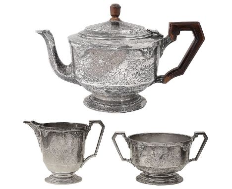 A George V Art Deco silver three piece tea service London, 1932 William Comyns &amp; Sons Ltdof plain circular tapering form 