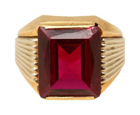 Synthetic ruby dress ringcentral rectangular cut synthetic ruby, tension set to tapering shank, stamped "750"ring size V, tot