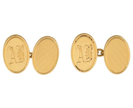 A pair of 18ct gold oval cufflinkswith engine-turned design, stamped with Birmingham hallmarkstotal approx. diameter 2cm, tot