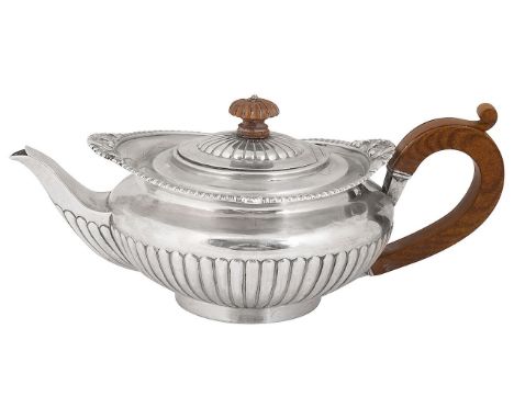 A late Victorian silver bachelors teapotLondon, 1888, Walter &amp; John Barnardof circular tapering half fluted form, flanged
