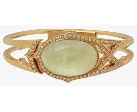 A rock crystal and diamond-set hinged bangle by Stephen Websterfrom the 'Crystal Haze' collection, of bifurcated sprung form 
