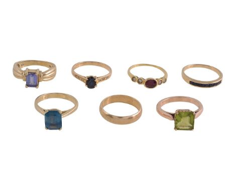A collection of gem set ringsruby and diamond set ring, central oval mix-cut ruby, bezel set between four circular diamonds, 
