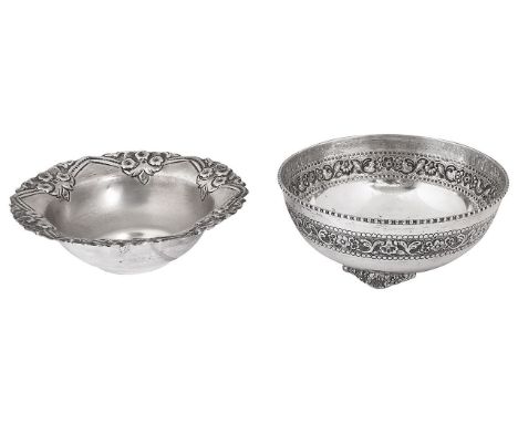 Two modern Indian silver bowlsfirst stamped indistinctly SILVER of circular tapering form with a foliate repousse band on fee