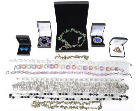 A collection of silver and costume jewelleryblue enamel circular brooch by Rachel Gogerly; purple enamel brooch by Rachel Gog