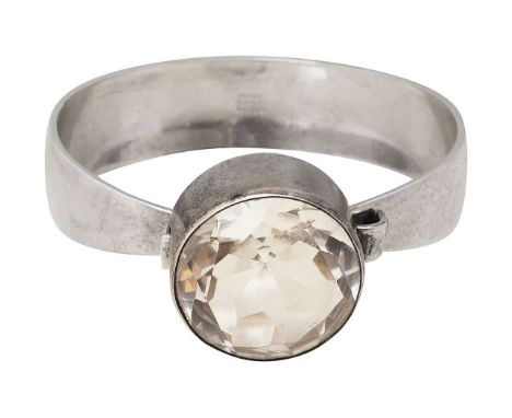 Silver and faceted rock crystal bangle designed by Niels Erik Frombezel-set circular mix-cut rock crystal (quartz), set to a 