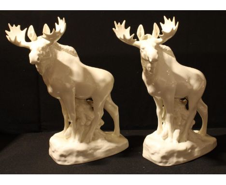 A ceramic model of a moose, glazed throughout in white, 35cm; another (2) 