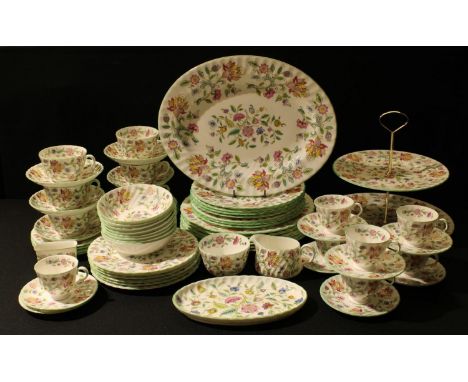 A Minton Haddon Hall pattern dinner and tea service for six, comprising dinner plates, salad plates, dessert plates, cake sta