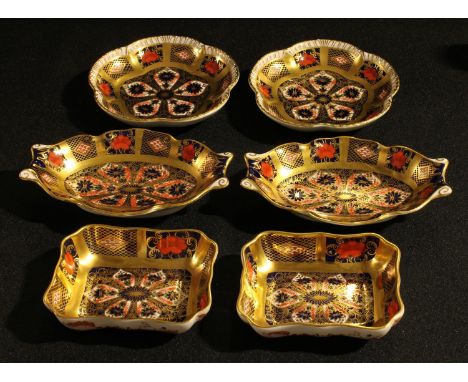 A pair of Royal Crown Derby Imari palette 1128 pattern rounded rectangular trinket dishes, solid gold band, 9.5cm, printed ma