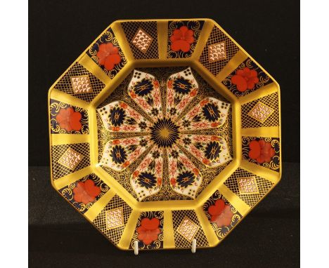 A Royal Crown Derby Imari 1128 pattern octagonal plate, solid gold band, 22.5cm, printed mark, first quality 