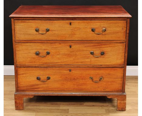 A George III mahogany chest, rectangular top with moulded edge above three long graduated cockbeaded drawers, brass swing han