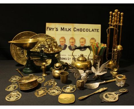 A set of kitchen balance scales, graduated bell shaped weights; a brass companion set; horse brasses; brass spill vase; a pai