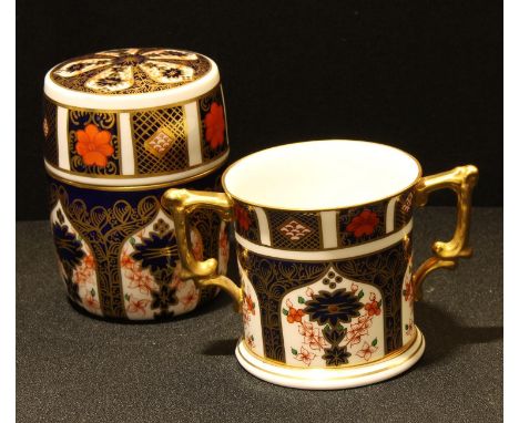 A Royal Crown Derby Imari 1128 pattern cylindrical caddy and cover, 10.5cm, printed mark in red; an 1128 pattern two-handled 