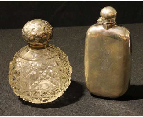 A silver hip flask, Sheffield 1899, 112g; a silver mounted dressing table scent bottle, Birmingham 1909 (2) 