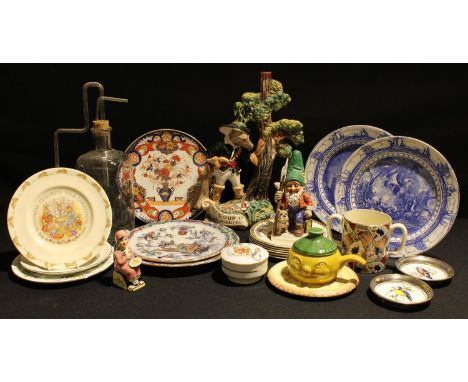 Ceramics - a Goebel gnome figure, 18.5cm high; a flatback, Le Loup et L'Agneau; a pair of Royal Doulton plates, Battle of Tra