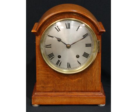 A Winterhalder &amp; Hofmeier oak mantel clock, 15cm silvered dial, Roman numerals, the architectural case quite plain, the p
