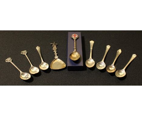 A pair of silver teaspoons, pierced monogrammed terminals, apparently awards from Worksop Golf Club, Sheffield 1964, 23.6g; f