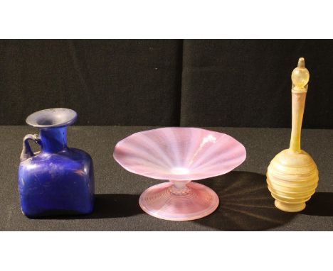 A Sowerby glass ribbed tazza; a Venetian/Roman glass vase with handle; an iridescent scent flask and stopper (3) 