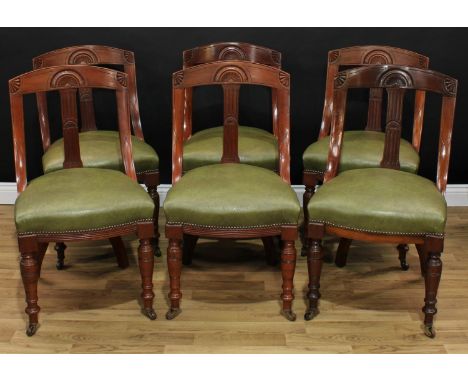 A set of six late Victorian dining chairs, each with a bowed cresting rail carved with demilune and quadrant stylised batwing