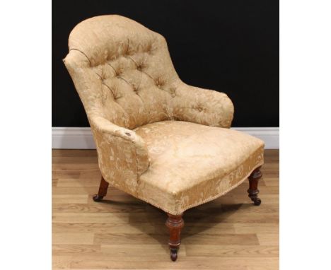 A Victorian drawing room chair, shaped deep-button back, stuffed-over upholstery, turned forelegs, ceramic casters, 80cm high