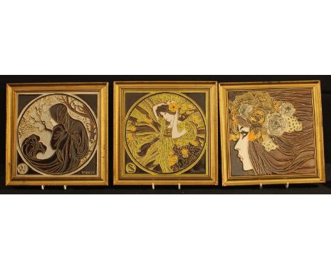 Three ceramic tubelined tiles, by Maw &amp; Co, Tunstall, depicting Winter, Summer and Spring, framed, 24.5cm square (3) 