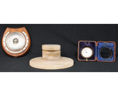 An early 20th century travelling timepiece; a novelty aneroid barometer, of equestrian interest; an Art Deco period white ony