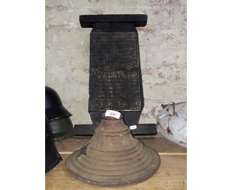 An antique Oriental shield, possibly Korean or Indonesian, used by horsemen and an old ebonised wood alphabet / manuscript bo