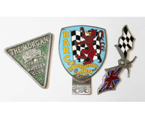 Three classic car badges comprising The Morgan Three Wheeler Club, BARC and a Union Jack &amp; Checkered flag badge.  