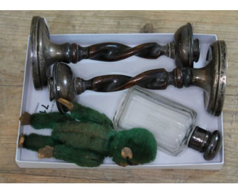 A pair of twisted oak and silver candlesticks, hallmarked for 1924, Birmingham, Sanders &amp; Mackenzie, a silver topped cut 