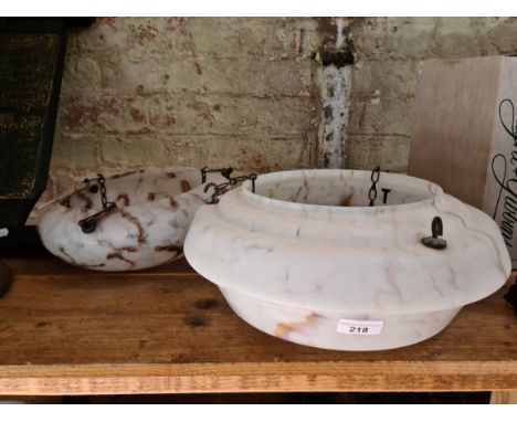 Two vintage light shades with chain attachments.  