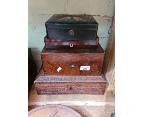 An Eastern carved wooden box and 3 other boxes including with mother of pearl inlaid top.  