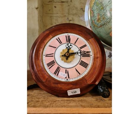 A postman's alarm wall clock.  