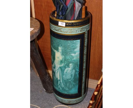A CERAMIC STICK STAND AND CONTENTS