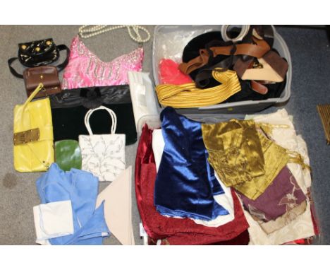 A BOX OF LADIES HANDBAGS TOGETHER WITH A TRAY OF ASSORTED TEXTILES